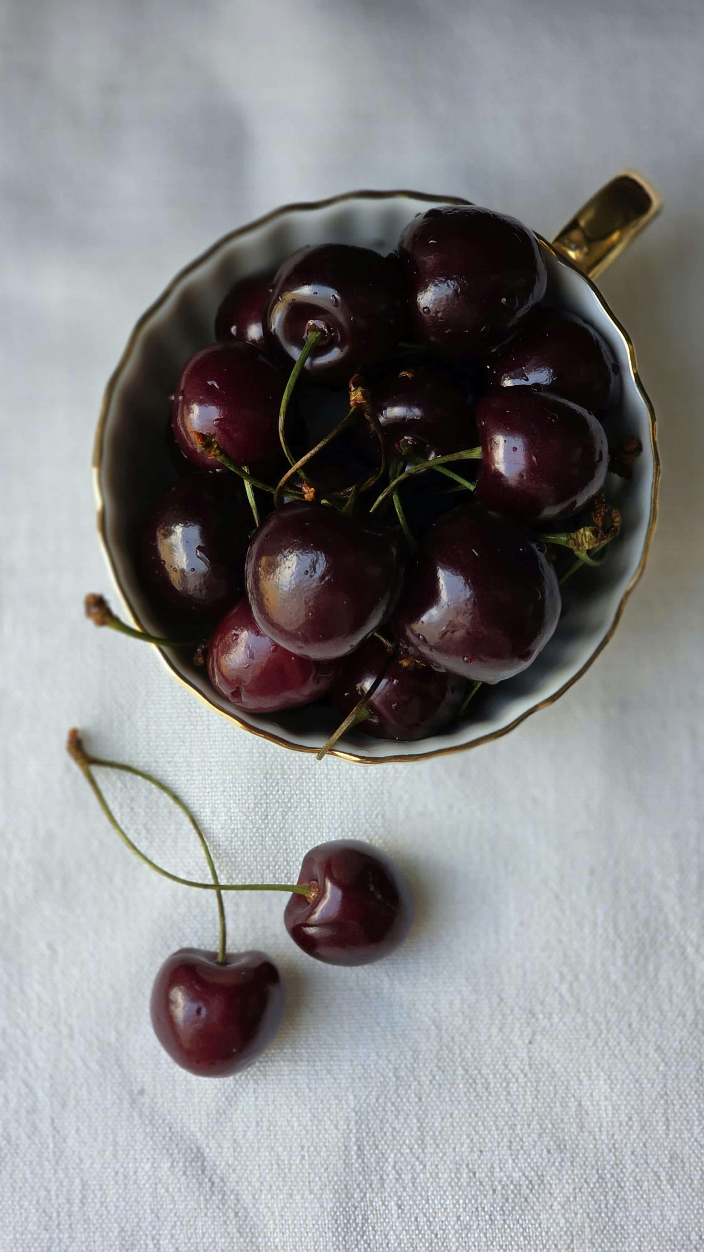 Close-up of shiny red sweet cherries